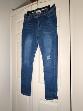 Dark Wash Skinny Jeans with Subtle Distress - Women